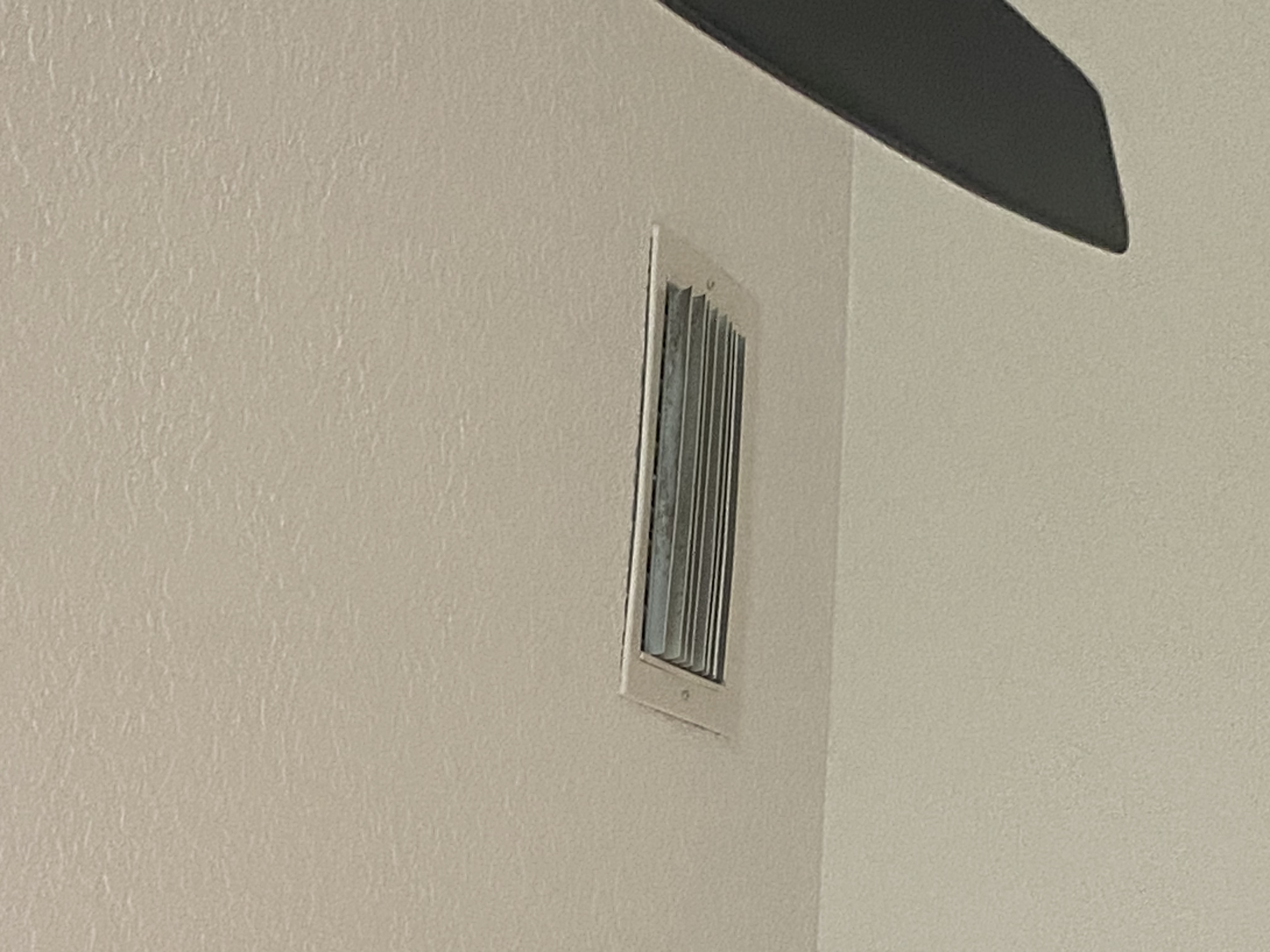 Visible buildup and grime on a supply vent cover